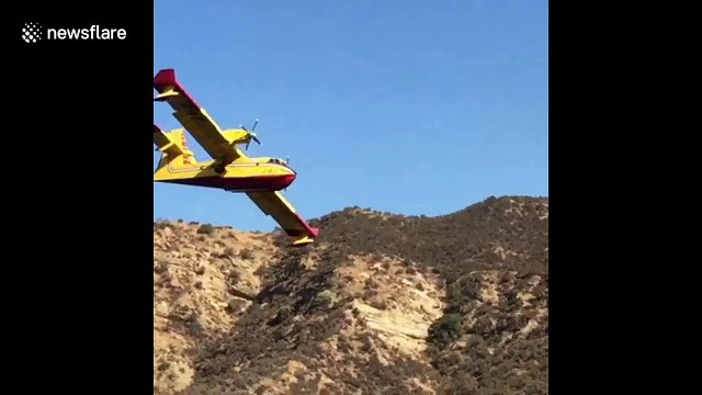 Fire crews employ Super Scooper aircrafts to fight growing Charlie Fire