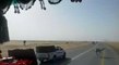 camels on road in saudi arabia
