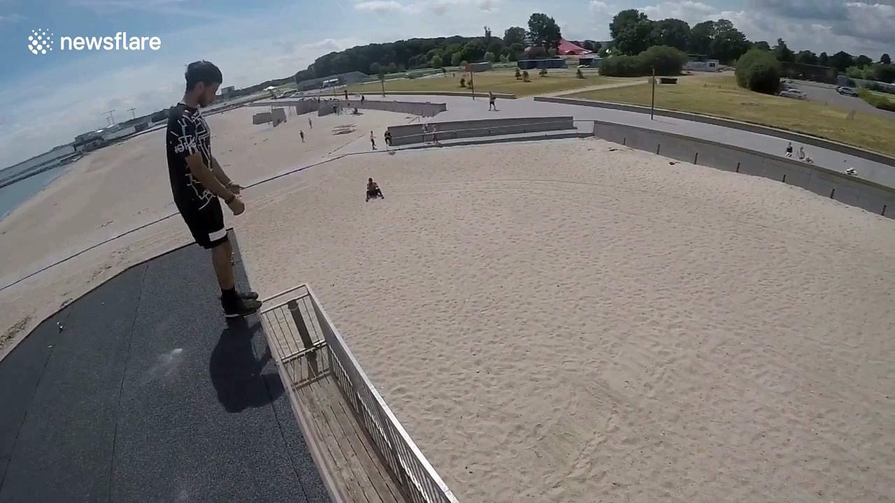 Parkour athlete flips off six metre-high roof