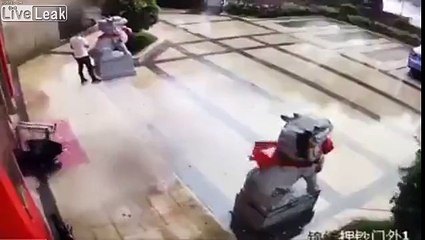 Man catches flying umbrella