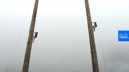 World pole climbing champ retains title in UK