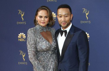 Chrissy Teigen and John Legend celebrated EGOT win with burgers