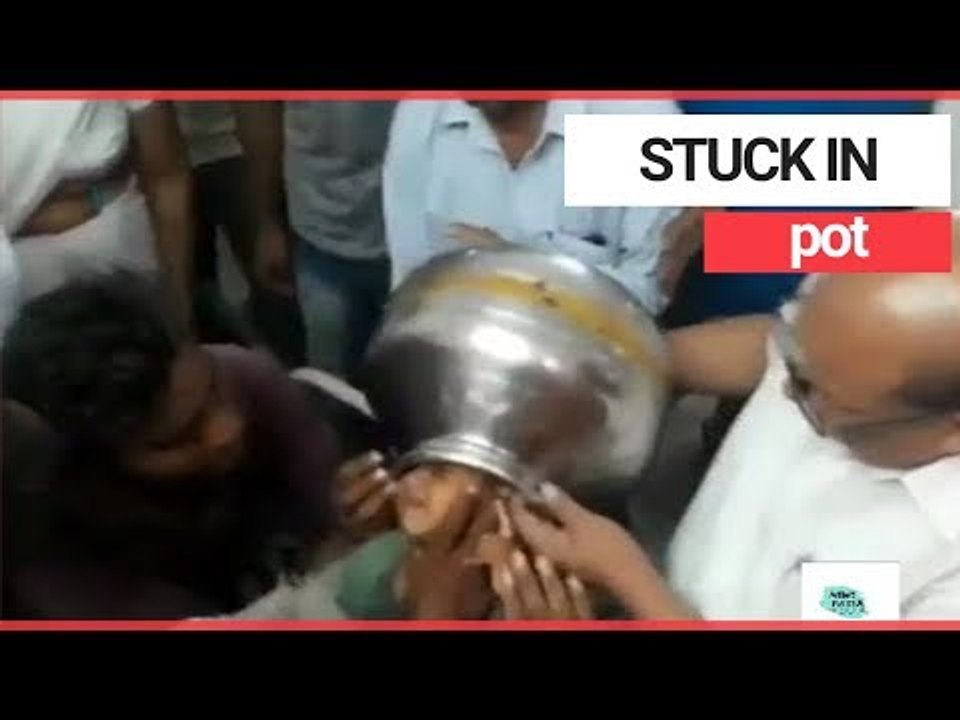 Boy gets head stuck in metal pot | SWNS TV