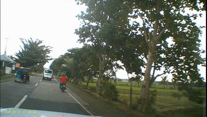 Motorcyclist slams in to back of swerving van