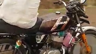 old man bike stunt| on highway