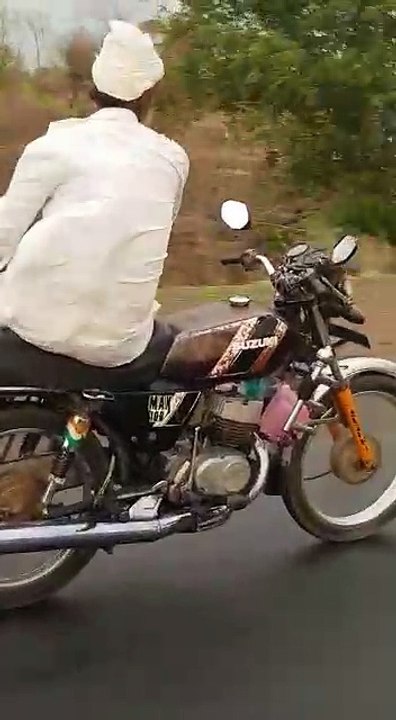 old man bike stunt| on highway