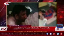 A man beaten up violently at Lahore by  Powerful Mafia