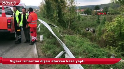 Sigara izmaritini dışarı atarken kaza yaptı