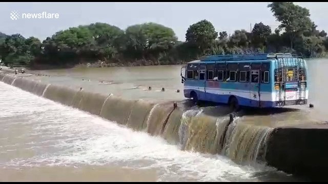 40 passengers endangered as bus rides through flooded bridge in central India