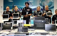 Investment scam syndicate busted, 99 arrested