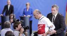 Erdoğan-Merkel Basın Toplantısında Yaka Paça Atılan Gazetecinin Kimliği Belli Oldu
