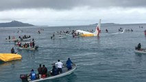 All passengers safe after plane misses runway and crashes into lagoon in Micronesia