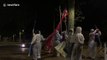 Catalan unionists remove pro-independence symbols at dead of night