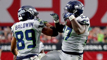 Mike Davis corkscrews his way to another rushing TD