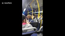 Woman refuses to give up seat, gives racist rant instead