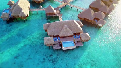 Flying over the St Regis Resort luxury overwater bungalow in Bora Bora  | :  incaidgalleries