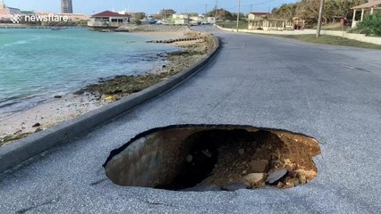 Roads in Okinawa, Japan wrecked by Typhoon Trami