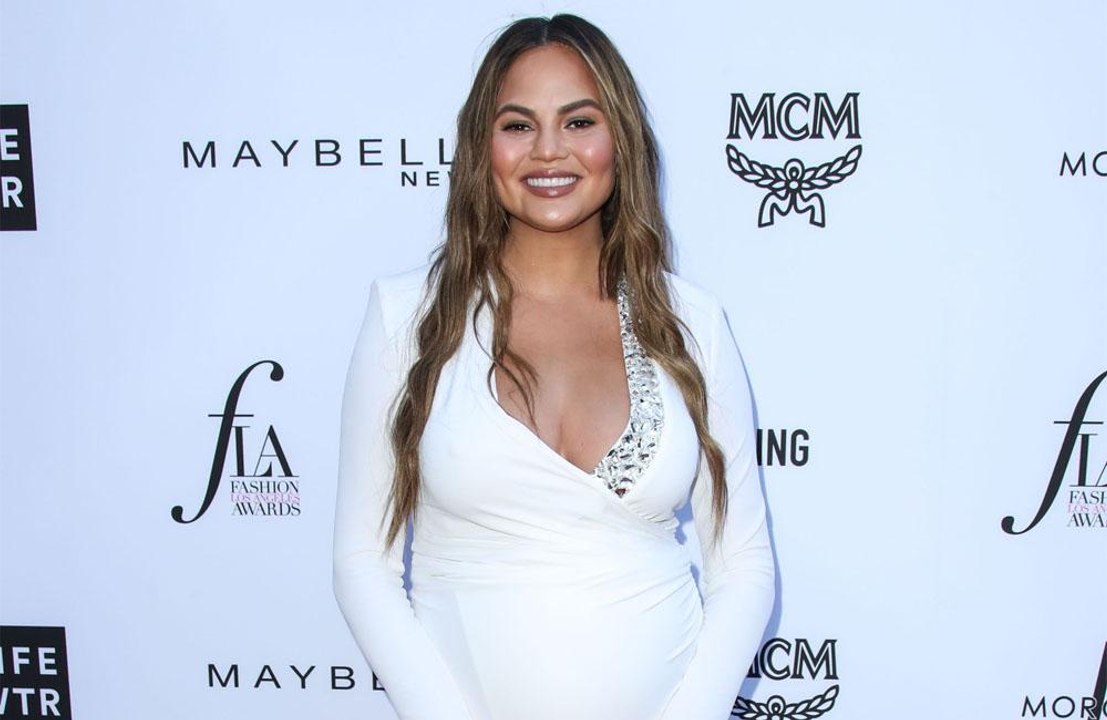 Chrissy Teigen thinks getting intimate with Cardi B and Rihanna would be 'ideal'