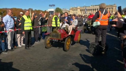 Vintage cars hit the streets of Paris for the city's 120th motor show