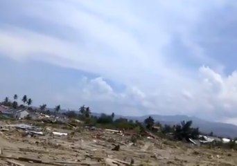 Red Cross Searches for Bodies in Suburb Flattened by Tsunami