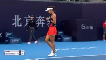 Wang double bagels Ostapenko in Beijing