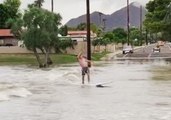 Arizona Man Attempts to Surf Hurricane Rosa Floodwaters