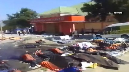 Bodies pile up outside hospital in quake-hit Palu