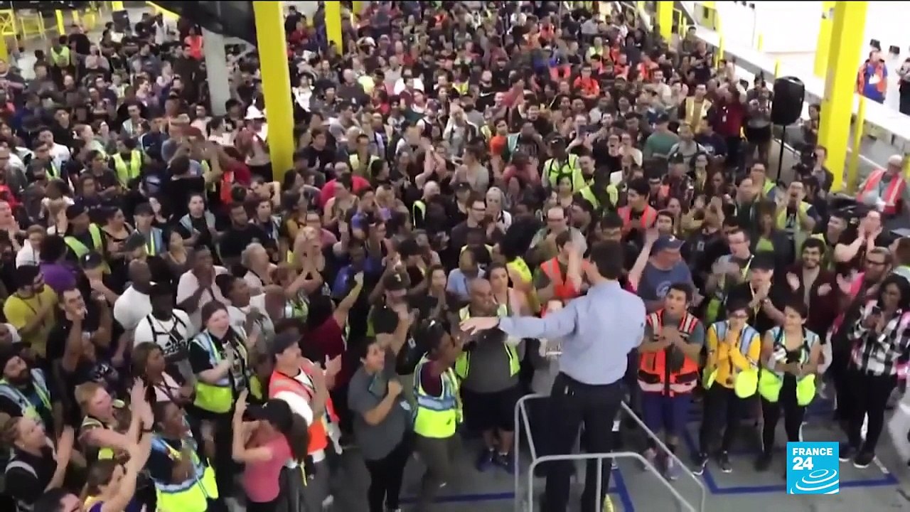 Amazon raises minimum wage for British, American workers