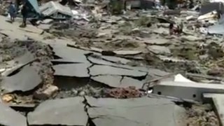 Sections of Palu Remain Covered in Debris Following Devastating Earthquake