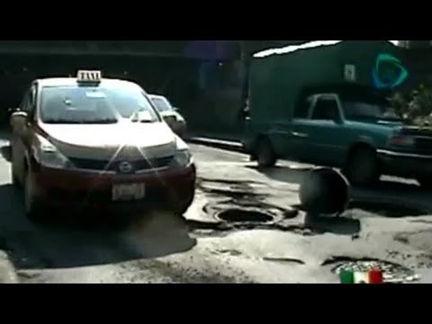 Desperfectos por baches pegan en el bolsillo de los automovilistas