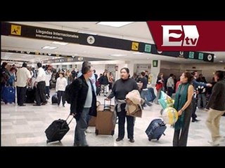 AICM apoya a pasajeros para el periodo vacacional de invierno 2013 - 2014 / Mariana H y Kimberly