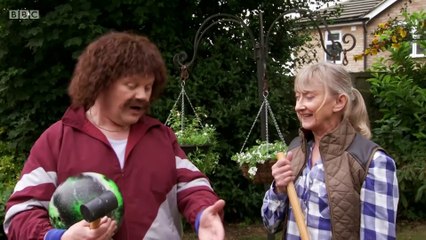 Keith Fitt demonstrates how to play croquet