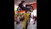 So amazing. A 48 year old woman moves around with a motorbike on her head.