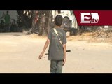 Niños aprenden en las calles a odiar a templarios / Andrea Newman