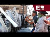 Fuertes enfrentamientos entre maestros y policías en el Congreso de Michoacán/ Titulares de la tarde