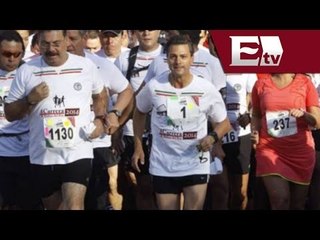 Peña Nieto participa en la 4ª Carrera del Molino del Rey / Titulares con Gloria Contreras