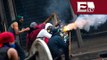 Duros enfrentamientos entre encapuchados y policias venezolanos/ Titulares de la tarde