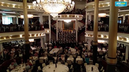 Waiters perform on the last night of the dinners