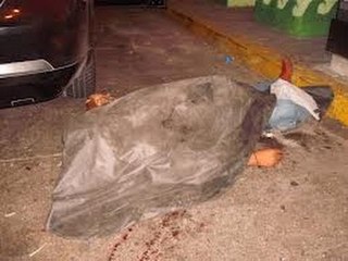 Asesinan a  mujer y abandonan su cuerpo en vía pública