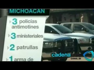 Normalistas de Cherán mantienen retenidos a 6 policías y varios autobuses