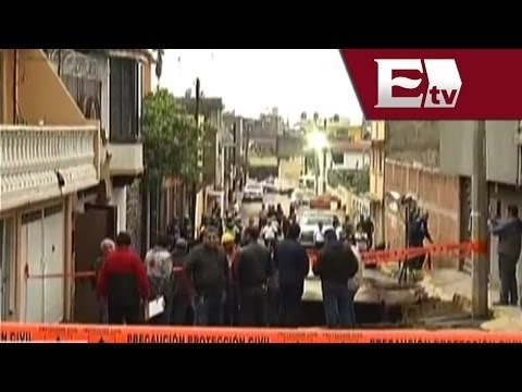 Regresan familias a sus hogares en Iztapalapa tras revisión de enorme socavón/ Comunidad