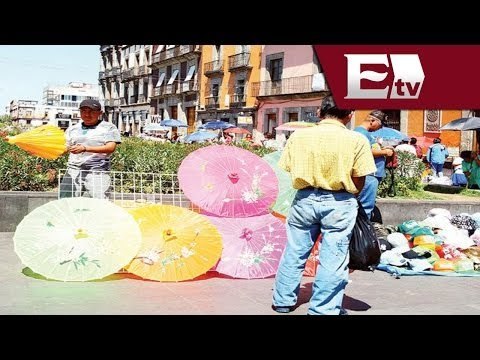 Trabajadores informales ganan 26% más que los formales / Dinero