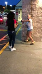 Phone Store Employee Chases Woman into Carpark