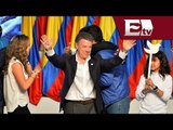 Juan Manuel Santos gana reelección en Colombia y promete paz con las FARC/ Global