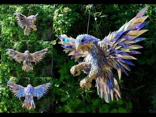 Animales hechos con trozos de CDs por Sean Avery