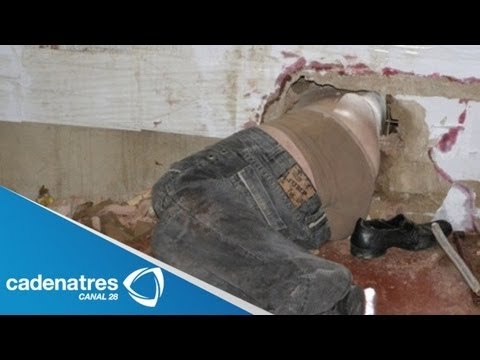 Impresionantes imágenes!!! Un hombre que queda atorado entre dos paredes en China (VIDEO)