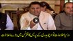 Information Minister Fawad Chaudhry talks to media