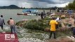 Ya son 156 toneladas de peces muertos en laguna de Cajititlán, Jalisco/ Gloria Contreras