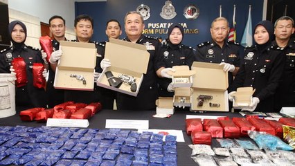 Download Video: Drugs worth RM1.5mil, three pistols seized from married couple