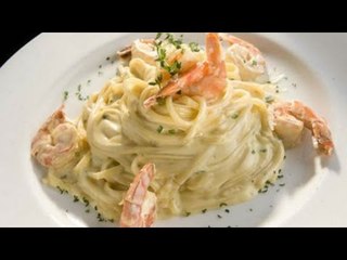 Pasta con camarones y jitomates